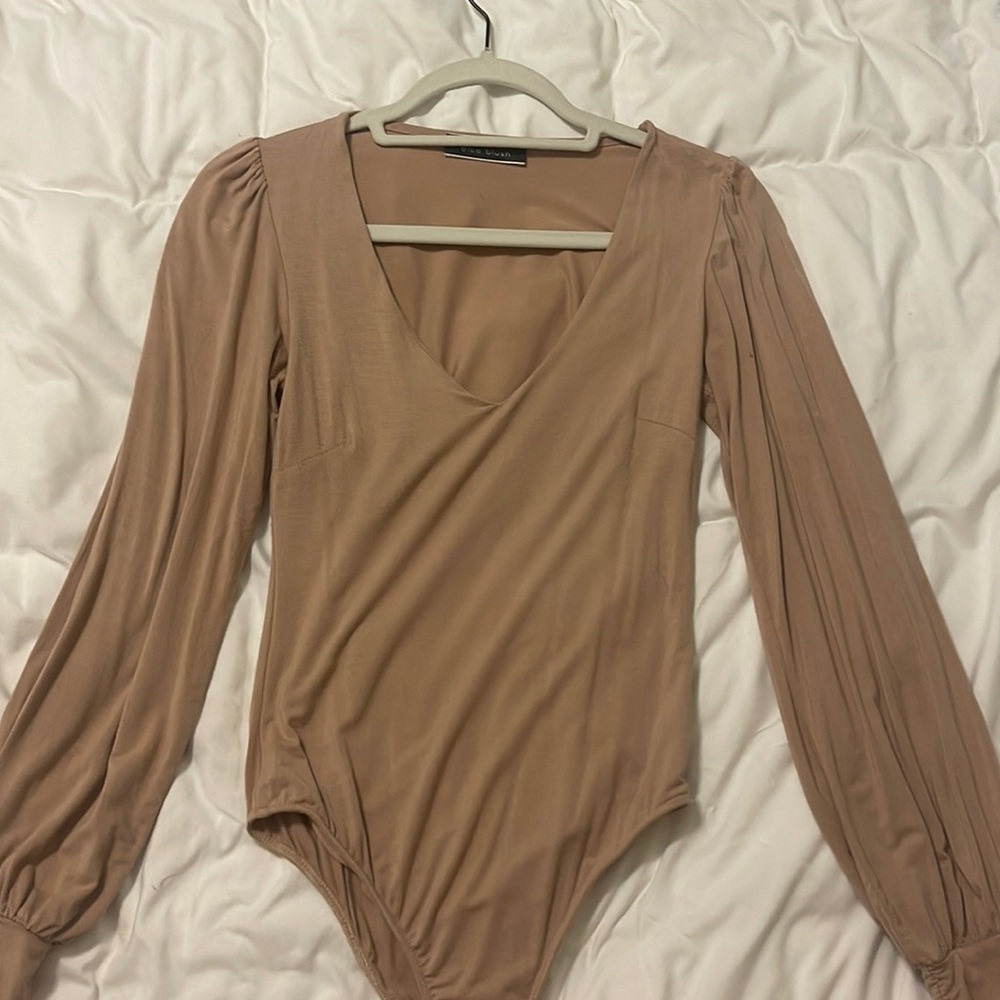 Nude long sleeve body suit